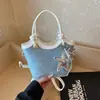 Bolsa pequena estilo transfronteiriço para mulheres, nova coleção primavera 2026, bolsa de ombro versátil, bolsa de axila e bolsa tipo balde crossbody