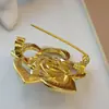 Broche de camelia perlado hueco con microincrustaciones retro y borde negro, elegante, dulce, de alta calidad, versátil, decoración para ropa de estilo occidental