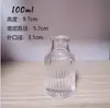 Botella de Aromaterapia Columna Romana de 100 ml al por mayor Botella de Vidrio con Raya Vertical Tarjeta de Material Blanco Fino Aromaterapia de Vidrio Romano