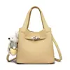 Bolso bandolera para mujer transfronterizo, bolso de hombro moderno y versátil 2026, bolso cubo informal y sencillo para el día a día, bolso de mano para el día a día