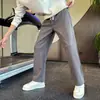 Pantalones casuales holgados versátiles para hombre en otoño e invierno, forrados de felpa, color liso, transpirables, elásticos, con una caída fresca, modernos pantalones de chándal nuevos