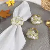 Hotel Transfronterizo mesa de restaurante occidental Phnom Penh hebilla para servilleta de flor anillo para servilleta anillo para servilleta de flor acrílica venta al por mayor