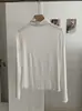 KEKEZOON Camiseta de manga larga ajustada de color liso con cuello semialto y volantes, hombro normal, prenda básica para mujer 8705