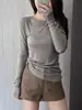 Camiseta muy elástica, suave y con buena caída para mujer, color liso de manga larga para principios de otoño, estiliza, hombro normal, cuello redondo, top versátil