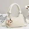 Bolso de mano tipo bolsa de dumplings nuevo y elegante de alta apariencia, bolso de hombro o axila versión coreana, bolso cruzado para mujer, bolso para mujer
