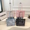 Bolso de hombro de verano 2026 nuevo, elegante y texturizado, gran capacidad, diseño simple, adecuado para ir al trabajo y uso casual