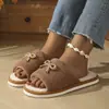 Novos chinelos de chão femininos de outono e inverno de alta qualidade, com laço transfronteiriço e sola macia, chinelos de algodão EVA da moda para uso doméstico