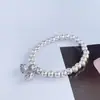 Nova pulseira de contas redondas banhada a prata em liga, semente de lótus lisa, pulseira de dossel de lótus, joias de drenagem de felicidade para duas vezes, atacado