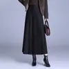 Saia midi de cor sólida com temperamento elegante, mistura de lã, nova saia plissada estilo coreano para outono e inverno, elegante e que rejuvenesce