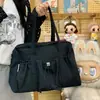 El nuevo modelo de este bolso de un solo hombro es un bolso de mano de gran capacidad para estudiantes universitarios, simple, elegante y casual, una bolsa tote para laptop para mujeres
