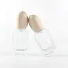 Ventas Directas de Fábrica Botella de Vidrio Cuadrada Plana de 30 ml para Base de Maquillaje Líquida Producto para el Cuidado de la Piel Esencia Protector Solar Crema BB Botella de Bomba para Loción