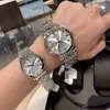 Reloj Dropshipping Suministros Langjia Reloj de Pareja Correa de Acero Calendario Hebilla Mariposa Reloj de Cuarzo para Hombre y Mujer Soymia Dw