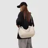 Bolsa de Ombro Simples Cor Sólida Nova Outono 2026 Moda para o Trabalho Bolsa de Axila Bolsa Transversal de Grande Capacidade Nicho
