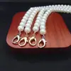 Bolsa de Corrente de Pérolas Artesanal de Alto Brilho para Venda por Atacado Acessórios de Corrente Bolsa Transversal Feminina Alça de Ombro Corrente de Pérolas Corrente de Pérolas para Celular