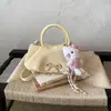 Bolso de mano de alta calidad para mujer, bolso de mano, accesorio de moda elegante, bolso popular este año, bolso de mujer con colgante de perla