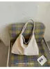 Bolsa de palha tecida, grande capacidade, estilo feminino, nova moda outono 2026, bolsa de ombro, bolsa de mão casual de nicho