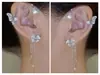 Venta caliente transfronteriza exquisito clip para oreja de flor de mariposa clip para hueso de la oreja clip para hueso de la oreja de nicho sin perforación borla clip para hueso de la oreja Nuevo