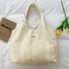 Shuai Mijia 2026 Verão Nova Bolsa de Mão Listrada Estilo Ins Simples e Estilosa Bolsa Tote Portátil para Lancheira para Mulheres