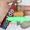 Pingente de Capivara Criativo Fofo Segurando Tartaruga Boneca Empilhada Chaveiro Pingente de Bolsa Chaveiro Pequeno Presente