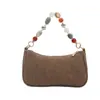 Bolsa feminina versátil de alta qualidade 2026 nova estilosa tendência moda bolsa de ombro única corrente sob o braço bolsa de mão de ombro único feminina