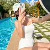 Oferta Especial Traje de Baño Enterizo de Color Sólido Coreano para Mujer, Estilo Puramente Sexy con Tirantes Cruzados y Espalda Hermosa, Traje de Baño Sexy para Aguas Termales al por Mayor