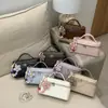 Bolsa de Mão Casual Diária com Design Nicho Estilo Coreano para Mulheres 2026 Primavera Nova Bolsa Quadrada Pequena Transversal
