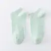 Calcetines de algodón de colores para mujer, primavera y verano, transpirables, color caramelo, calcetines invisibles de boca baja al por mayor, calcetines de algodón de color liso para mujer, calcetines tipo barco