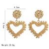 Pendientes de metal exagerados con personalidad de moda europea y americana, pendientes simples con relieve geométrico en forma de corazón, venta directa de fábrica al por mayor
