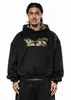 Conjunto de sudadera con capucha y bolsillo casual de estilo urbano americano y pantalón de chándal recto de pierna ancha con estampado de camuflaje, unisex