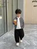 Chaqueta Suéter para Niños Otoño Nuevo 2026 Tejidos para Niños Pequeños Rayas Estilo Coreano Versátil Cárdigan Top para Bebé