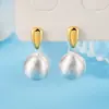 Brincos de Tarraxa Redondos Escovados de Nicho para Mulheres, Luxo Leve, Tachas de Temperamento Único, Novo Estilo 2026, Mais Vendidos, Brincos Femininos com Toque de Alto Padrão
