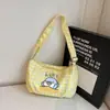 Bolsa de hombro de dibujos animados a cuadros linda de gran capacidad, nueva bolsa de lona versátil para estudiantes, bolso cruzado, bolso popular para commuting, bolso con forma de dumpling
