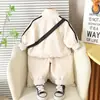 Conjunto de Sudadera con Dos Rayas y Pantalones para Niño Nuevo Primavera y Otoño 2025 Venta al por Mayor desde Fuente de Fábrica