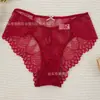 Calcinhas Europeias e Americanas Transfronteiriças para Mulheres com Bordado Francês e Design de Textura Vazada, Cor Sólida, Respirável, Sexy