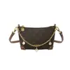 Bolsa de design de nicho de comércio exterior feminina 2026 nova super quente bolsa de mão com monograma bolsa de ombro versátil estilosa bolsa transversal