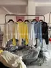 Suéter de Tricô Renda Vazada Estilo Francês com Gola Redonda e Mangas Flare, 2026 Feminino Primavera/Verão Crochê Manga Longa Top para o Dia a Dia Proteção Solar