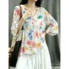 Ropa de mujer talla grande 2026 nuevo top de verano de gasa estampado con cuello en V y manga acampanada, adelgazante y rejuvenecedor, camisa para ocultar la barriga
