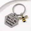 Llavero de Goteo de Aceite de Girasol y Abeja Más Vendido Transfronterizo Etiqueta Grabada de Acero Inoxidable Colgante para Bolsa de Regalo del Día del Maestro