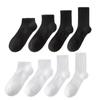 Medias clásicas en blanco y negro y gris para hombre y mujer, de color liso, con cintura antideslizante, de tubo medio, para deportes, informales, transpirables, de algodón.