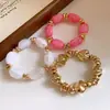 Pulsera elástica de acrílico geométrico irregular vintage nueva con un diseño de nicho, joyería de moda trendy para mujer