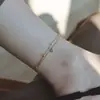 Tornozeleira de Aço Titânio com Diamante Único de Camada Dupla, Levemente Luxuosa e de Alta Qualidade, Feminina, Exquisita e Versátil, Nova Moda Tornozeleira com Diamante Brilhante e Acessórios para Pés