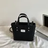 Bolsa pequena feminina 2026 novo modelo primavera/verão, textura de alta qualidade, design de nicho, bolsa transversal versátil vintage, bolsa de mão tipo balde
