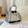 Bolso Cruzado para Mujer 2025 Nuevo Bolso Cubo de Deportes de Montaña Versátil Bolso de Hombro para Exteriores y Senderismo para Estudiantes Varones Moderno