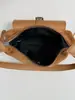Nuevo bolso de hombro de color liso de alta moda para principios de otoño de 2026, bolso de hombro de nicho moderno y elegante para el trabajo y los desplazamientos, bolso cruzado