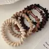Elástico de Cabelo Espesso e Elástico para Adultos na Cor Café para Rabo de Cavalo, Corda de Cabelo com Alta Elasticidade, Faixa de Cabelo Simples Fashion Ondulada Venda por Atacado