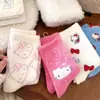 Calcetines de media pantorrilla Hello Kitty Calentitos de felpa gruesa Calcetines para el suelo del hogar Chica de dibujos animados linda japonesa Dulce