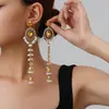 Pendientes étnicos de talla europea y americana más vendidos, pendientes largos ovalados en forma de lágrima, estilo étnico elaborado y creativo con incrustaciones de diamantes de alta gama