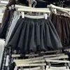 Falda corta de línea A floral anti-exposición de nuevo estilo para primavera y otoño 2026 para mujeres petite, falda midi entalladora de cintura alta