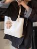Bolsa Tote de Grande Capacidade Estilo Coreano Feminina Lançamento Moda Versátil Bolsa de Mão Bolsa de Ombro Única Simples de Nicho para Mulheres 2025 Primavera