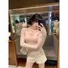 Nueva colección de otoño e invierno, pura y seductora, diseño que ciñe la cintura y estiliza, prenda básica de punto de manga larga con cuello en V en color rosa especial